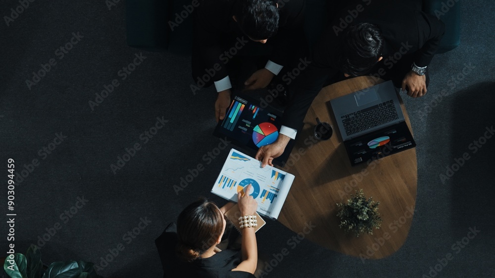 Aufkleber top down aerial view of business team analyze stock investment data while pointing at financial stat