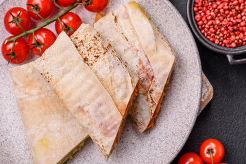Delicious juicy roll or shawarma with chicken, tomatoes, salad and sauce