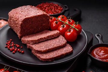 Delicious canned pink ham with salt, spices and herbs