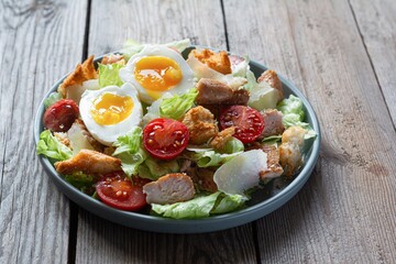 Fresh Caesar salad with chicken. Healthy breakfast, brunch.  