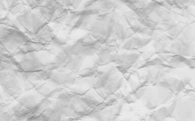 Crumpled white paper background.