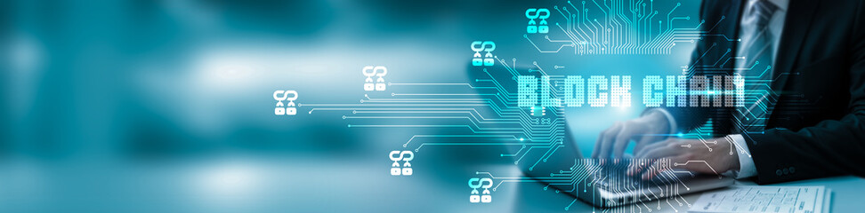 Hand touching laptop, network connection on blockchain technology and futuristic developments. Blockchain is transforming the digital landscape with its secure, decentralized, and transparent systems.