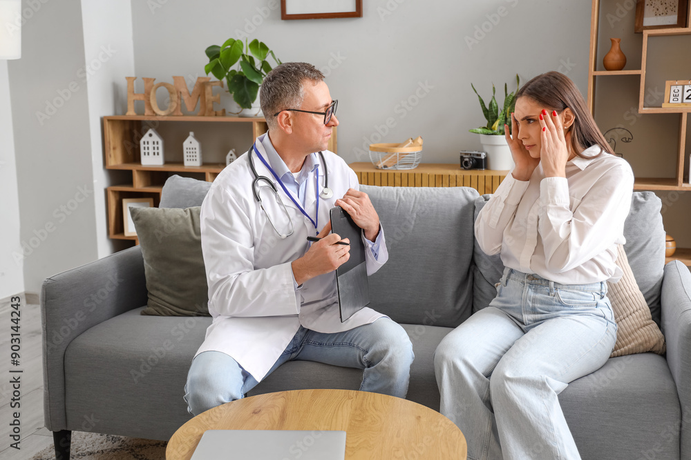 Canvas Prints mature doctor with ill young woman at home