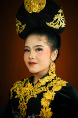 young asian women wearing makeup, wearing batik clothes and Indonesian cultural attributes