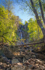 Tall Waterfall with Low Flow and Partially Dry Stream