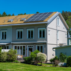 Solar power panels on the roof of a house.