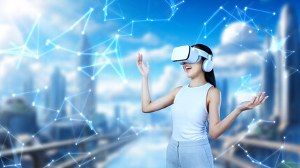 Female stand wear white VR headset and white sleeveless connect metaverse, future technology create...