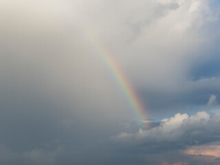 Fototapeta premium Rainbow and clouds