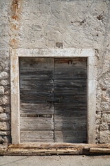 Old wooden door on the Adriatic Sea