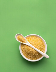 Japanese yellow panko crumbs in spoon and bowl