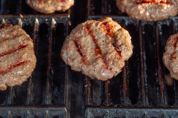 Selective focus background image of burgers grillin summer activitie