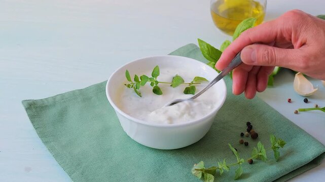 Tzatziki. Greek sauce in a white bowl