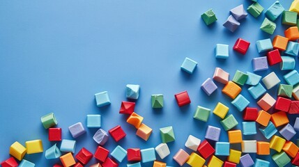 Colorful cube bead inscription on blue background with space for text