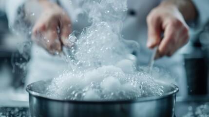 Fototapeta premium A chef rigorously boils water in a metal pot with a lot of steam rising, showcasing the intense cooking process in a professional kitchen environment.
