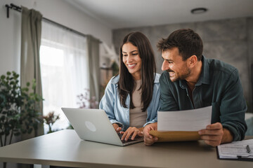 couple boyfriend and girlfriend read together letter from envelope