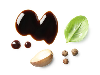 Delicious balsamic vinegar, basil, garlic and peppercorns isolated on white, top view