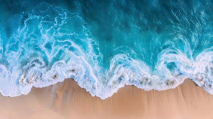Fototapeta premium Aerial View of Sandy Beach and Ocean With Waves