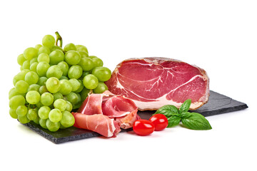 Italian prosciutto crudo or spanish jamon with grape, isolated on white background.