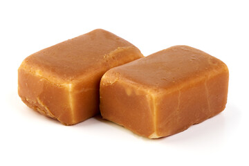 Cheesecake candy bar with caramel glaze, caramel curd cheese, isolated on white background.