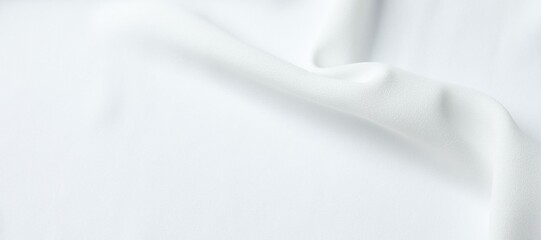 Texture of white fabric as background, top view