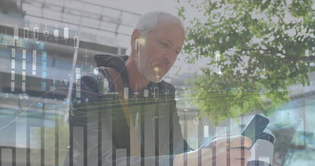 Image of financial data processing over caucasian man with smartphone on the go