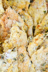 grilled chicken with seasoning on a plate 