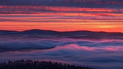 Fototapeta premium Sunset Over Majestic Mountain Range with Colorful Sky