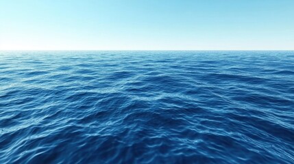 Obraz premium A serene, endless blue ocean under a clear sky, showcasing the vast and peaceful nature of the sea and horizon.