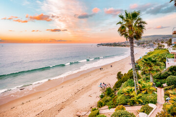 Laguna Beach ocean shoreline with palm trees at Treasure Island Park, Orange County, California USA