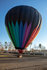 Obraz premium Hot air balloon landing in park in Winchester California United States