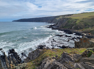 Ocean coast in South Australia, rocks, unusual black stones. Seascape