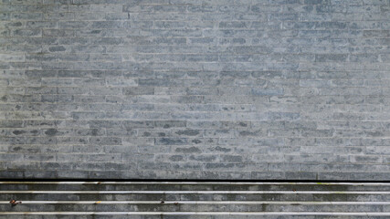 Fototapeta premium grey brick wall background design, construction industry