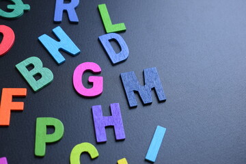 colorful letter alphabet on black background, object for education