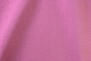 pink cotton texture color of fabric textile industry, abstract image for fashion cloth design background