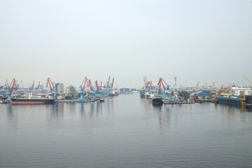 Container Ship Docked In The Port For Loading And Unloading Containers