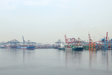 Obraz premium Container Ship Docked In The Port For Loading And Unloading Containers