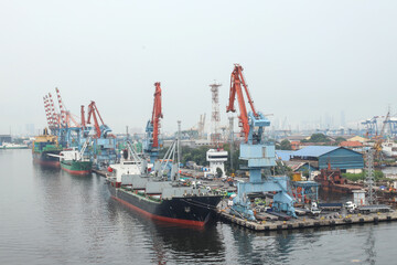 Container Ship Docked In The Port For Loading And Unloading Containers