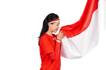Indonesian woman celebrating Indonesia's independence day on 17 August by holding the Indonesian flag isolated transparent