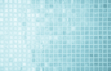Abstract blue background with some smooth lines in it and some reflections of tile wall.