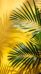 Mango with palm leaves shadow on a pastel yellow background. Tropical summer vibe.