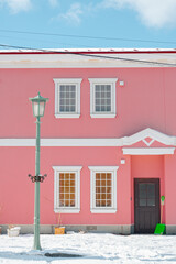 Pink house and winter snow in Hakodate, Hokkaido, Japan
