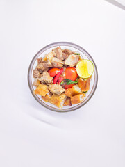 Soto Bogor, Bogor's typical soto noodles taste savory with complete fillings such as sliced meat, noodles, vegetables and vermicelli risol, Soto Bogor in a bowl, homemade food in bowl