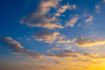 Enjoy a panoramic view of the skyline. The sun rises in the morning sky with colorful clouds. and beautiful cloud patterns In the soft light of the morning	