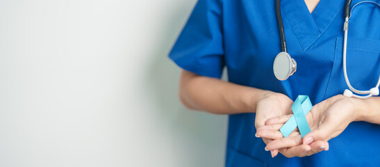 Blue November Prostate Cancer Awareness month, Doctor with Blue Ribbon in hospital for support...