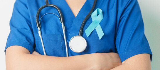 Blue November Prostate Cancer Awareness month, Doctor with Blue Ribbon in hospital for support...
