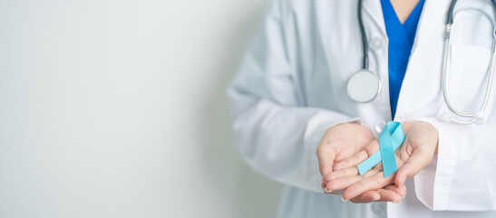 Blue November Prostate Cancer Awareness month, Doctor with Blue Ribbon in hospital for support...