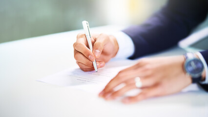 Business, hands and writing on document in office for legal contract, compliance report or...