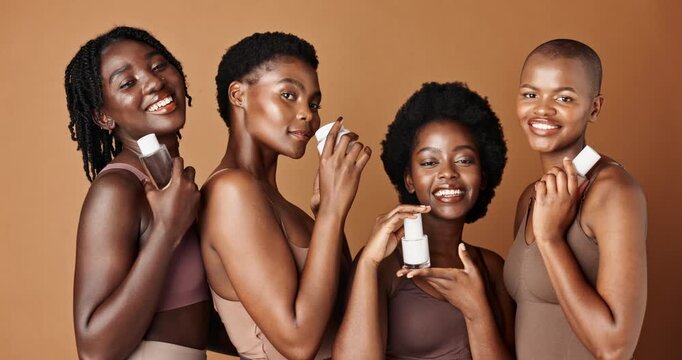 Black woman, skincare and product for branding, beauty or tone foundation by a brown studio background. Group portrait of African female people or model smile for skin, marketing or advertising