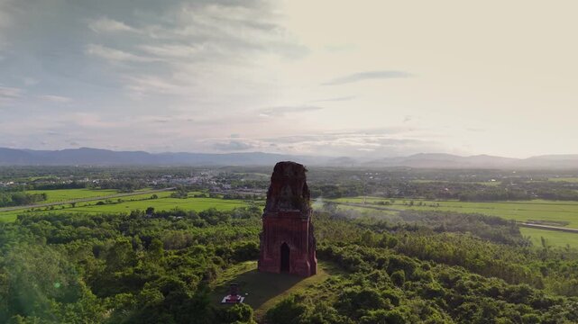 Phu Loc Champa Temple, aerial fly out, reveal in the late afternoon setting sun light. Quy Nanh, Vietnam.