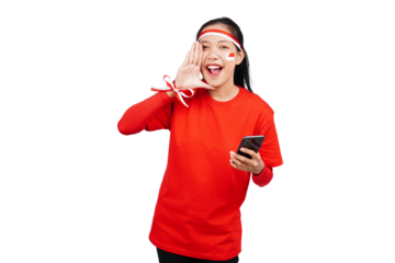 An Indonesian woman celebrating Indonesia's independence day on 17 August while holding smartphone with blank screen isolated transparent
